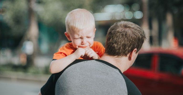 When Dads Hold Their Toddlers, Why Do They Sometimes Scream?