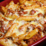 Baked rigatoni pasta with bolognese sauce and cheese